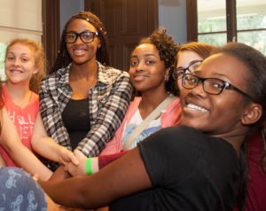 Teen girls smiling at the camera